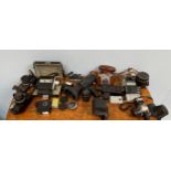 A large quantity of cameras including Zeiss, Pentax, Bells & Howell 2146 video camera, Olympus OM