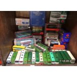 A collection of 16 boxed 1:76 scale die-cast model buses by EFE, corgi and more including Oxford