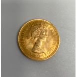 A Queen Elizabeth II Gold Sovereign, 1963, Mary Gillick portrait Obv. / Rev. St George & Dragon