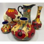 Five assorted Old Tupton Ware tube-lined hand painted vases, including three ‘Yellow Poppy’ examples