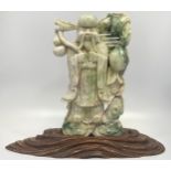A large Jadeite carved figure of Sau, the Chinese god of longevity, carved with double gourd,