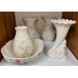 Five assorted large Belleek pottery items comprising vases, one modelled as a shell, a bowl and a