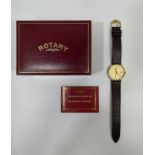 A gents 9ct gold-cased wristwatch by Rotary, the circular case with gold dial, batons denoting the