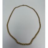 A 9ct yellow gold roller-ball link chain, measuring 20 inches in length, weighing 28 grams.