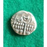 A Durotriges spreadtail silver stater. Wreath pattern with upward-facing leaves. Disjointed horse