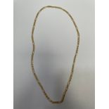 A 9ct yellow gold figaro link chain, weighing 7.0 grams, measuring 24 inches.