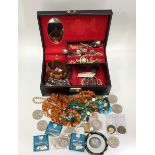 A quantity of costume jewllery including a string of cultured paerls, variois silver jewellery,