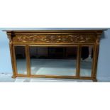 A rectangular gilt over-mantel mirror in the neo-classical 'style' with panel of carved dragons,