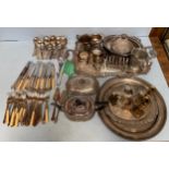 A large quantity of silver-plated items including a large twin-handled tray, Walker & Hall flatware,