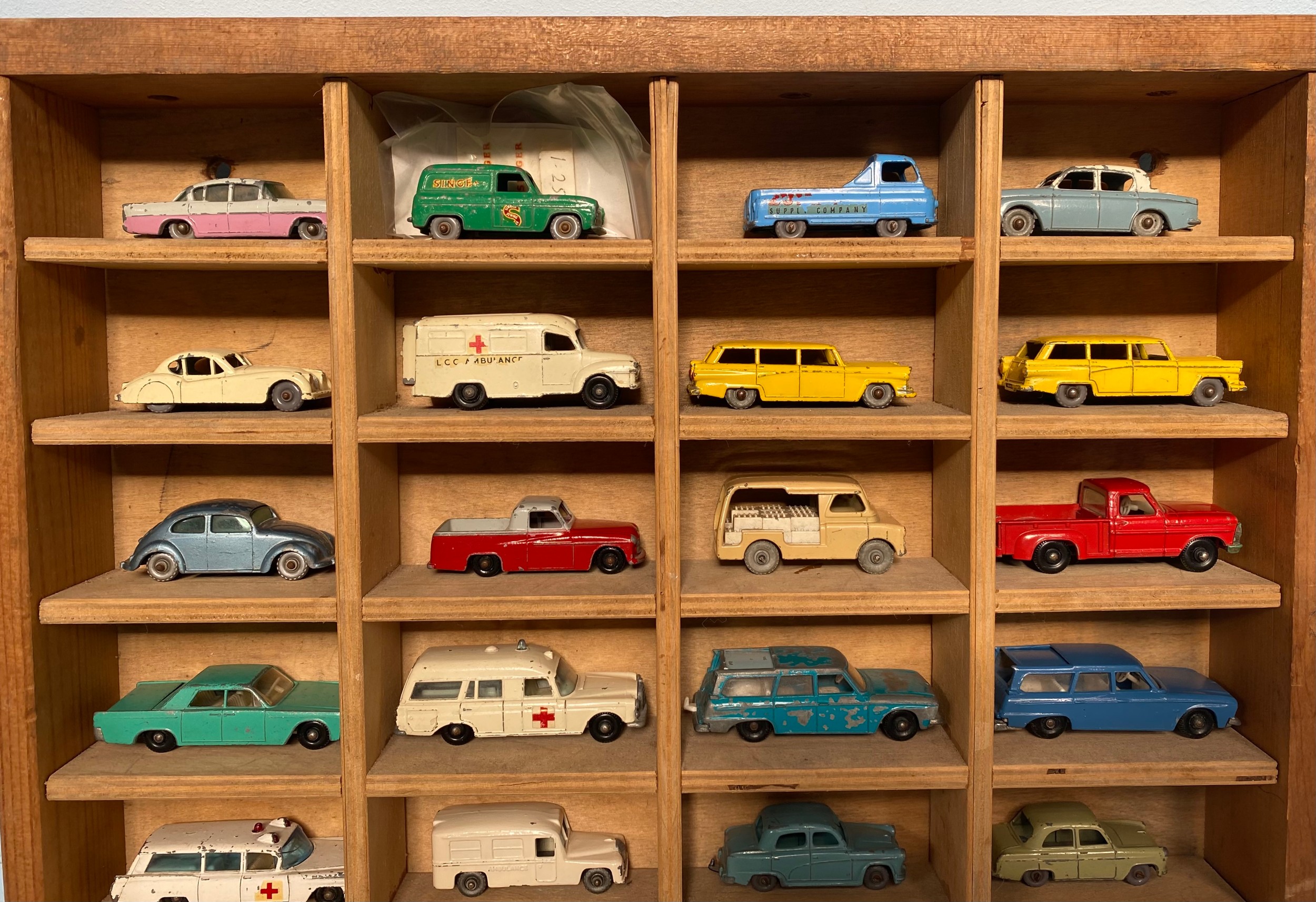 A collection of 32 loose play worn die-cast model vehicles, housed in wooden display case, - Image 2 of 3