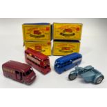 Four Lesney Matchbox series diecast model vehicles, examples include No. 69 Nestle's Commer 30 CWT