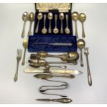 A cased set of silver teaspoons and three various silver teaspoons including a Georgian example,