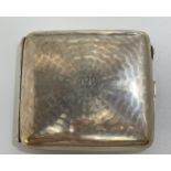 A silver cigarette case by John Rose, with RB monogram to front, dated 25th December 1916 and with
