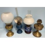 Four various oil lamps including one converted from a Chinese ginger jar (4)