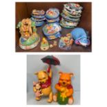 A quantity of Winnie the Pooh decorative items including a ceramic Disney ‘Hunny of a Day’ musical