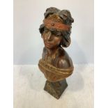 A Goldscheider 'style' Art Nouveau painted plaster figure of a bust of a young lady dressed in