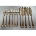 A silver part fish knife and fork set comprising five knives and six forks, Sheffield, 1914,