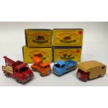 Four Lesney Matchbox series diecast model vehicles, examples include No. 26 Cement Lorry, No. 13