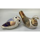 Two Royal Crown Derby paperweights comprising Millennium Dove, with gold stopper and an owl, both