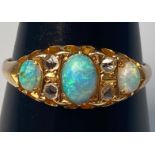 An 18ct gold, Opal and rose-cut diamond ring, 3.0g, ring size 'S'