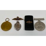 A WWI Victory Medal awarded to DVR H Blakeman, together with a WWII Service Medal, an RAF cap badge,