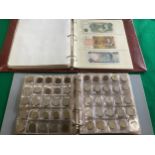 A suitcase containing several hundred UK and foreign coins – including two albums of mixed coinage