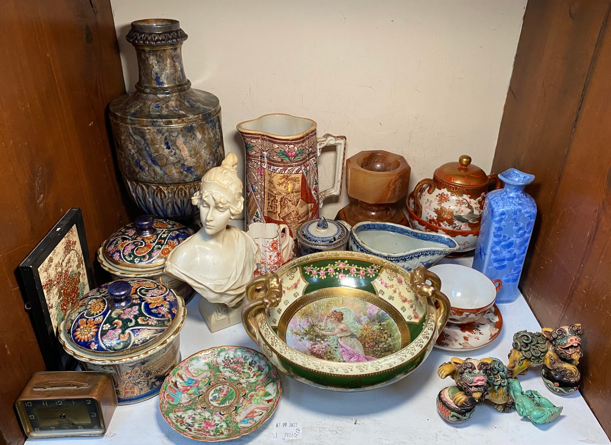 A mixed lot including a pair of Chinese porcelain Foo dogs, Satsuma eggshell wares, Chinese blue