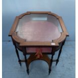 A stained walnut bijouterie table with shaped top, inlaid floral canted corners, red velvet lined