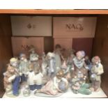 Seventeen various Lladro and Nao porcelain figures including A Friend for Life No. 07685, World of