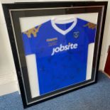 A framed replica/commemorative Portsmouth FA Cup Semi-Final shirt by Kappa, bearing approximately 20