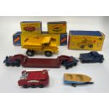Four Lesney Matchbox series diecast model vehicles, examples include King Size No. 5 Foden Dumper