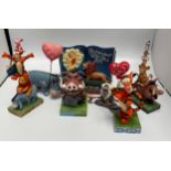Seven various Disney Showcase Collection figures including four from The Lion King, Tigger, Winnie