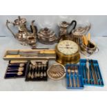 A quantity of silver plated teapots, milk and cream, quantity of flatware and a brass cased bulkhead