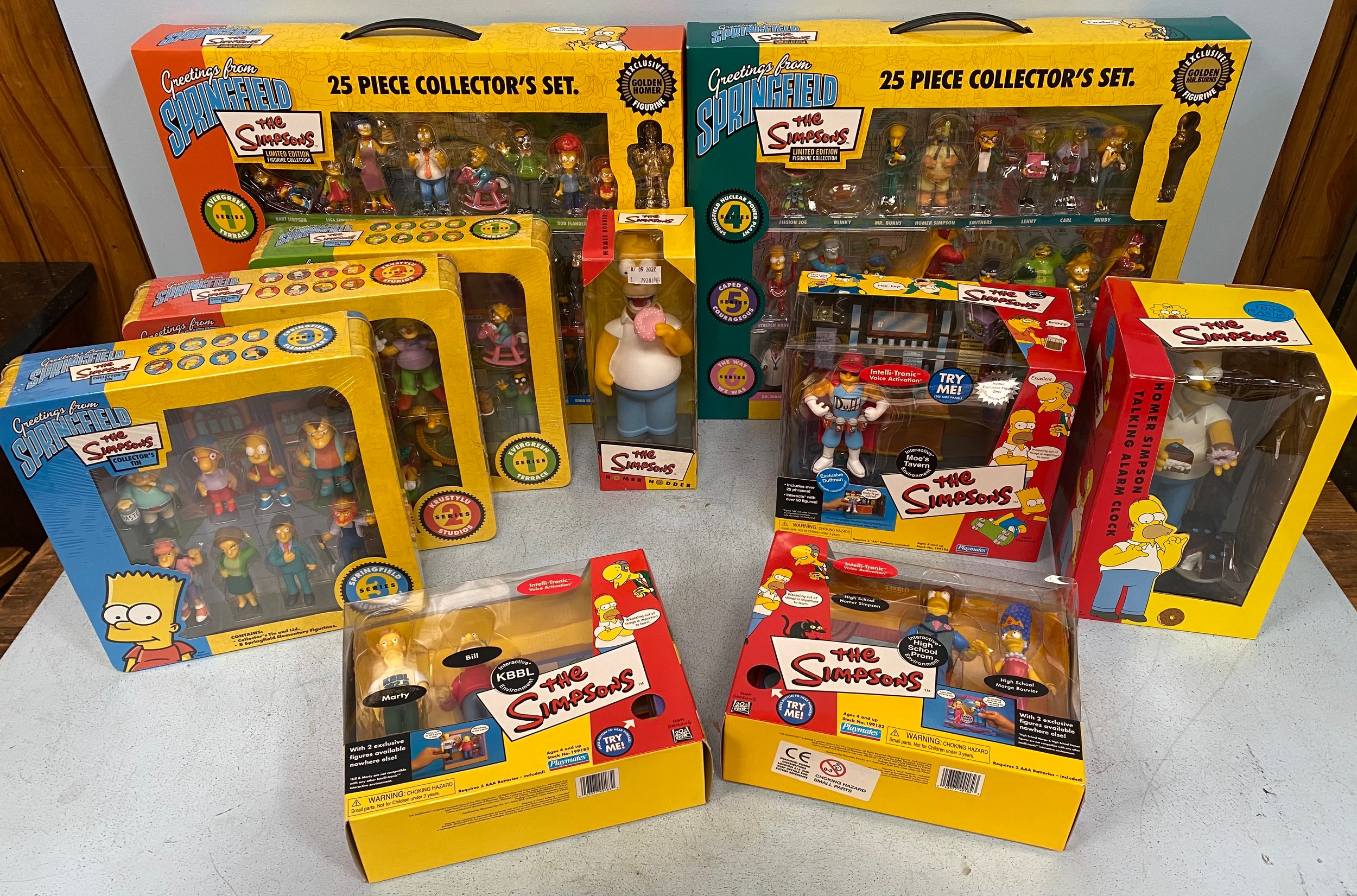 A quantity of The Simpsons collectable figurine sets including three boxed Playmates Official