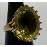 A lady’s 14ct gold dress ring, 16-claw set with a large oval citrine coloured stone, 20x15mm,