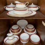 A Paragon ‘Holyrood’ pattern part tea and dinner service with red and gilt rims comprising three