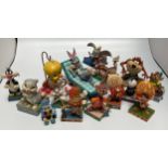 Fifteen smaller Disney Showcase Collections figurines including cartoon characters such as Tweetie