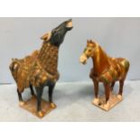 Two various Chinese porcelain Tang horses including one painted in gilt highlights and applied