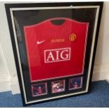 A framed commemorative Manchester United 2008 Moscow Champions League Final shirt by Nike, a