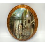A Venetian canal scene with gondola, oil on convex oval wooden panel, 24cm