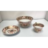 Three 19th century Spode porcelain items including a cup, small plate and a bowl, all in the Imari