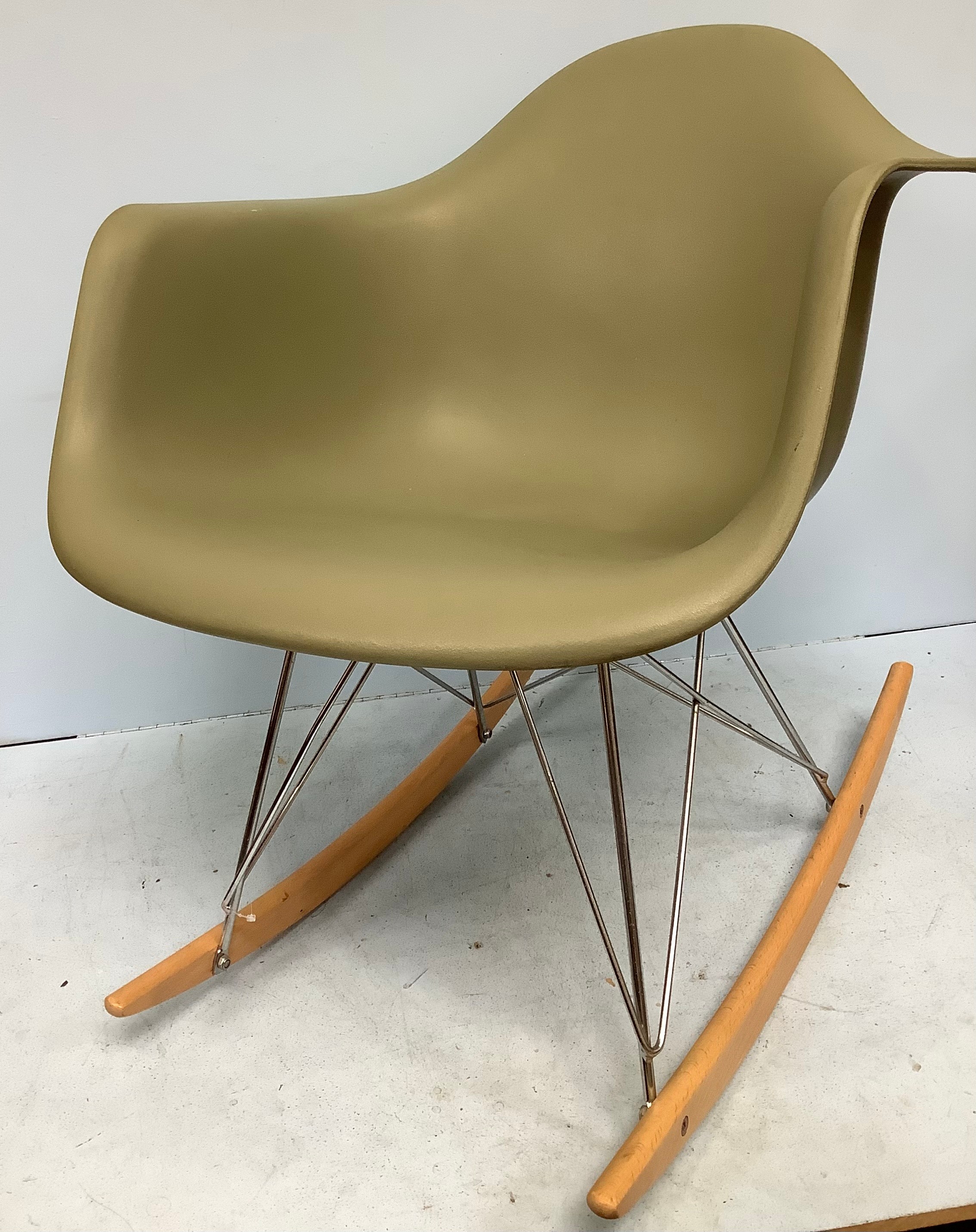 After Charles & Ray Eames for Herman Miller, a modern copy of an RAR (Rocking Armchair Rod Base)