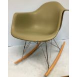 After Charles & Ray Eames for Herman Miller, a modern copy of an RAR (Rocking Armchair Rod Base)