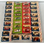 Thirty six various boxed Days Gone die cast model cars including eight Dr Pepper vehicles and