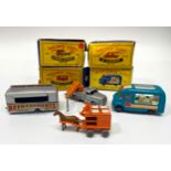 Four Lesney Matchbox series diecast model vehicles, examples include No. 7 Horse-drawn Milk Float,
