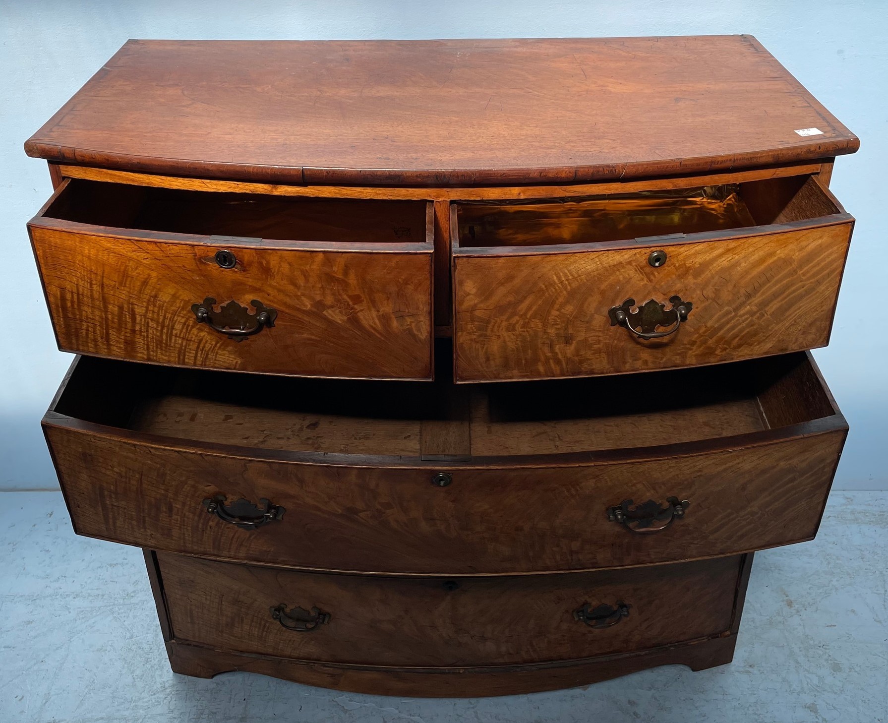 A 19th century mahogany bow-front chest of two short and three long flamed graduated drawers with - Bild 2 aus 2