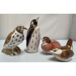 Four assorted Royal Crown Derby paperweights comprising ‘Song Thrush’, with gold stopper, a