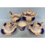 A Copeland & Garrett late Spode Feldspar 'Wellington' shape porcelain teacup of gilt blue ground