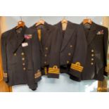 Four Royal Naval uniforms including a Commander No.5 dress uniform with Kings crown buttons and a