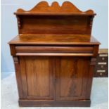 A 19th century mahogany chiffonier with raised shaped back, central pulvinated drawer over two